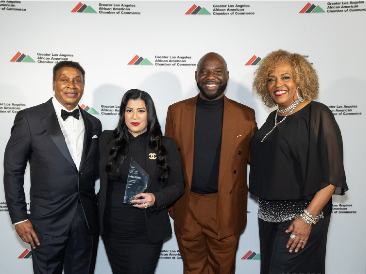 Gene Hale (Chairman, GLAAACC), Cameron Onumah (Head of Southern California Policy, GLAAACC) and Angela Gibson Shaw (President, GLAAACC) pose with Christina Tulfo (Supplier Diversity Manager, AEG).